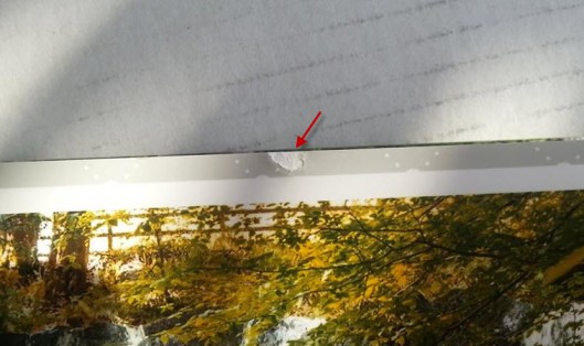 de beschadiging van de bladzijde